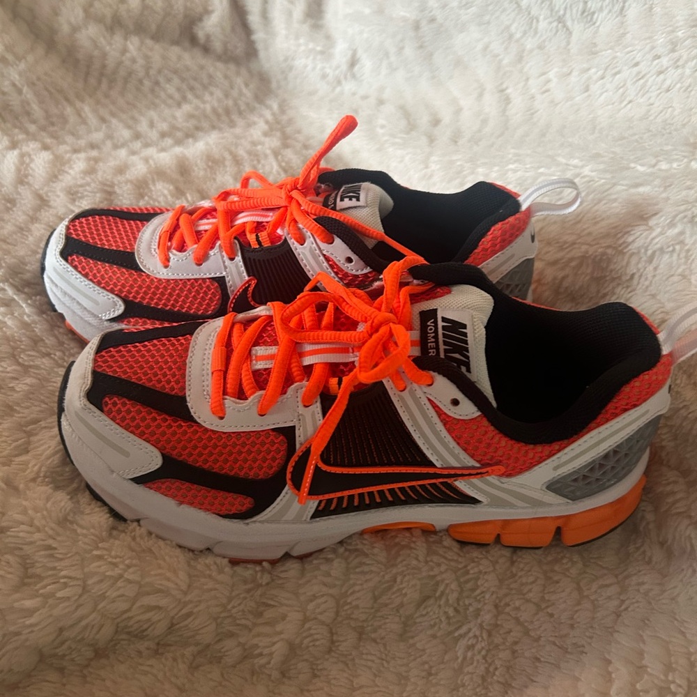 Nike Orange and Black Sneakers with Bold Design